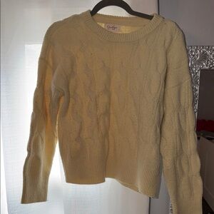 Yellow cable knit sweater